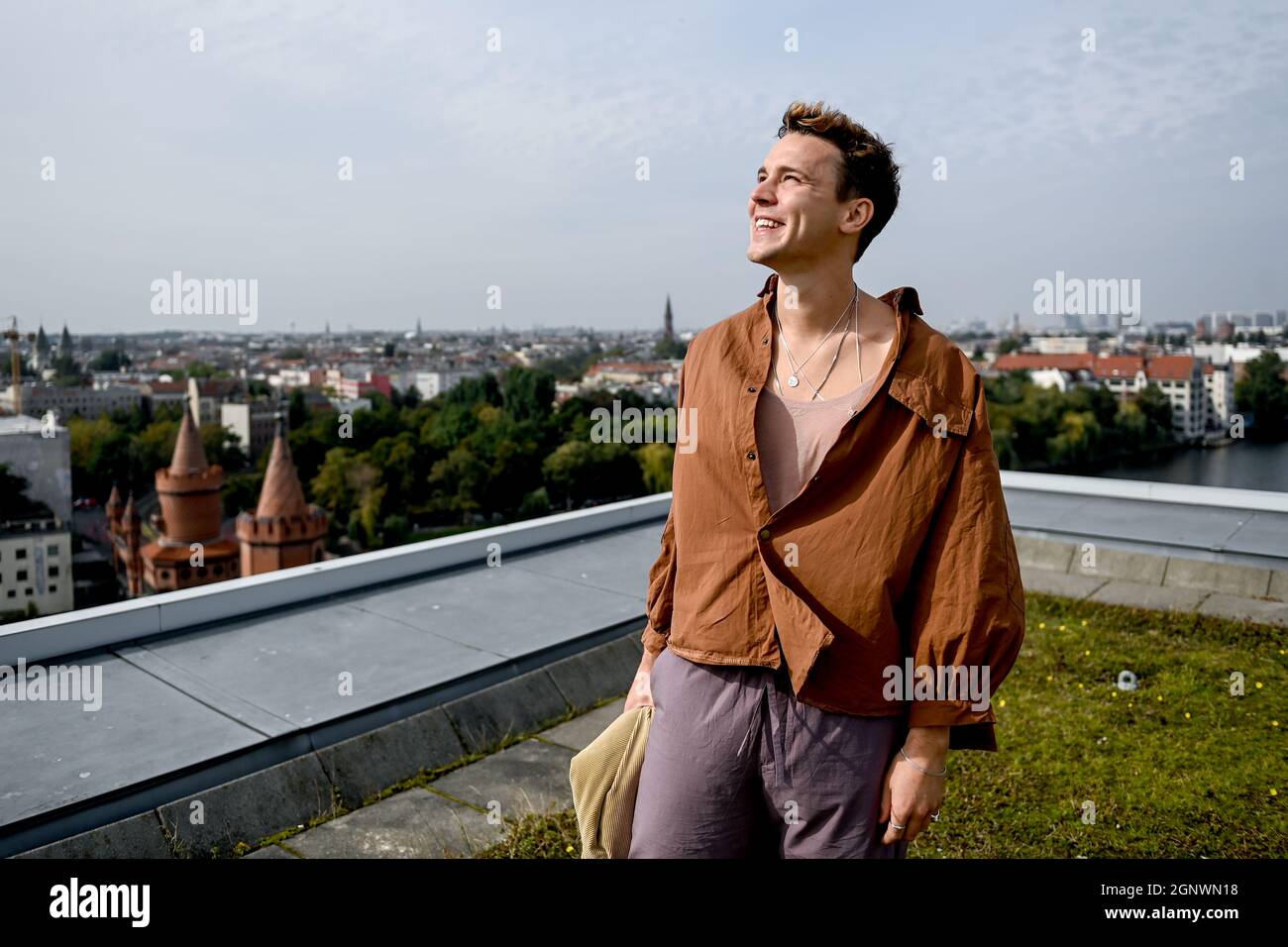 Berlin, Germany. 23rd Sep, 2021. Felix Jaehn, musician, producer and DJ, stands on the edge of a dpa interview on the roof of the Universal building on the Spree. Jaehn, who used to live with anxiety, has, in his own words, come through the Corona crisis mentally well. (To dpa 'DJ Felix Jaehn: Was in self-isolation even before Corona') Credit: Britta Pedersen/dpa-Zentralbild/dpa/Alamy Live News Stock Photo