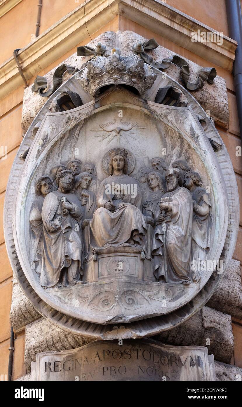 Descent of the Holy Spirit, relief on the facade of a palace in Rome, Italy Stock Photo