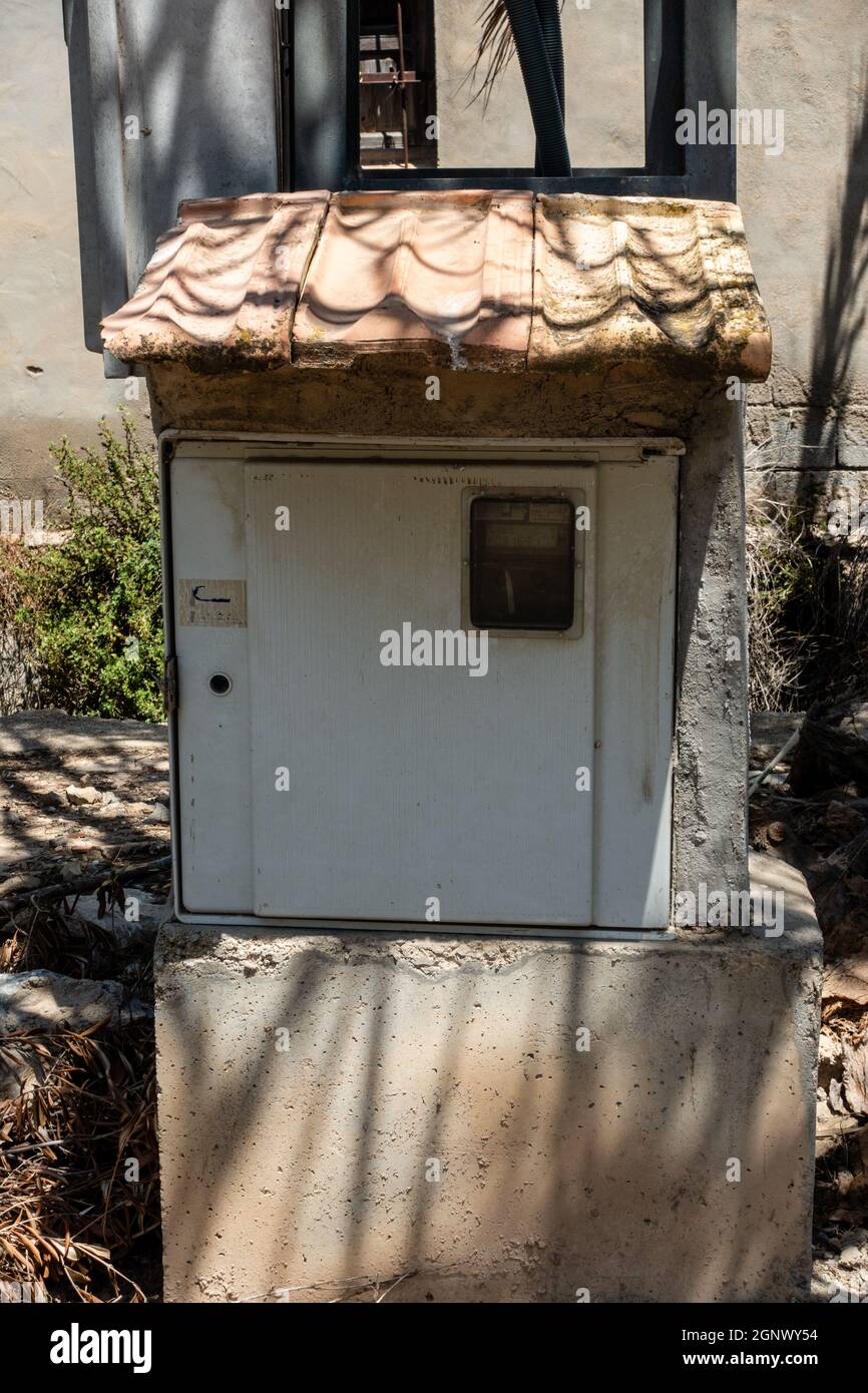 electric meter box with a tiled roof Stock Photo Alamy