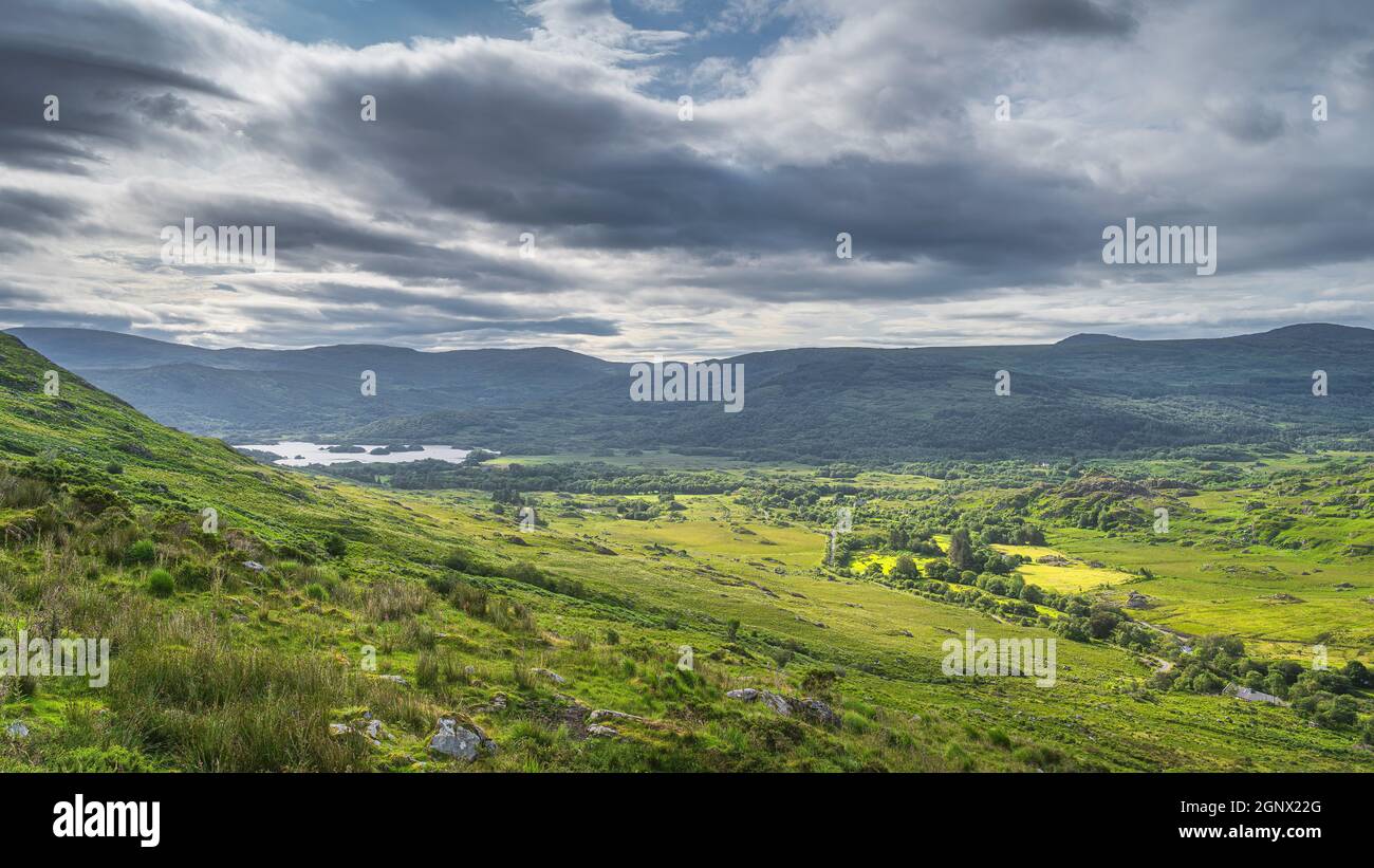 Single houses in vast and majestic Black Valley with lake, river and