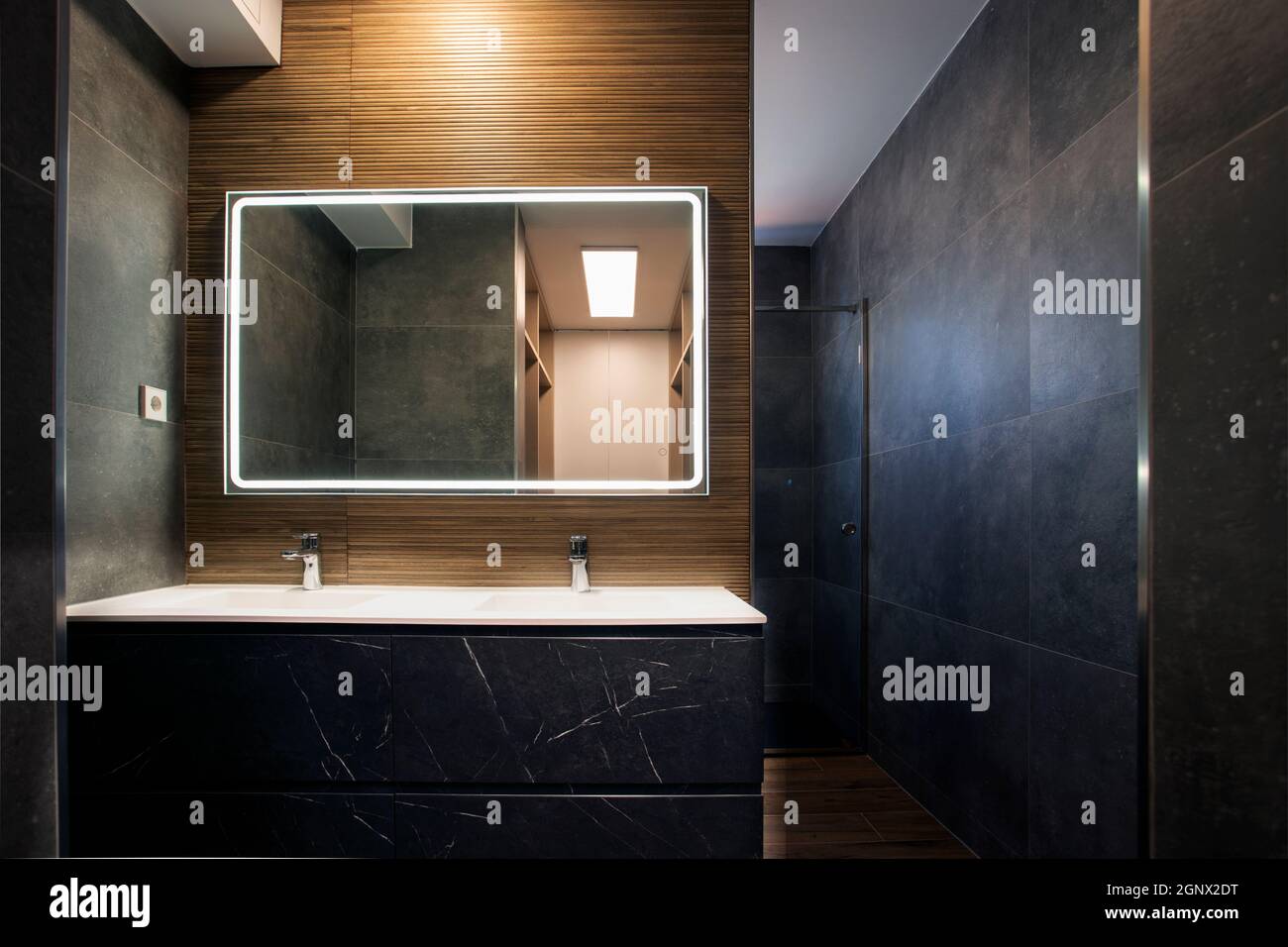 Marble Double Sink Vanity With Mirror With Light In Grey And Brown Bathroom Design Stock Photo Alamy