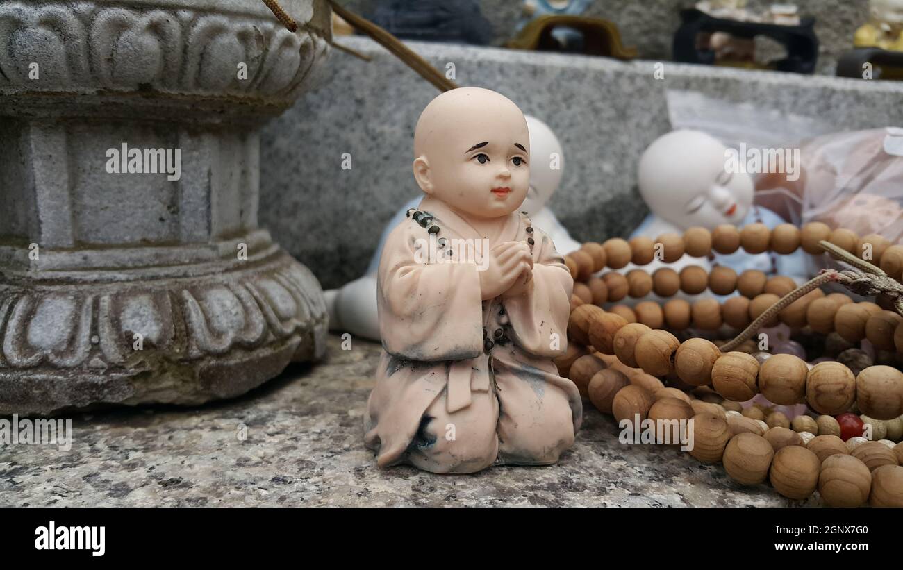 Cute little Buddha Stock Photo - Alamy