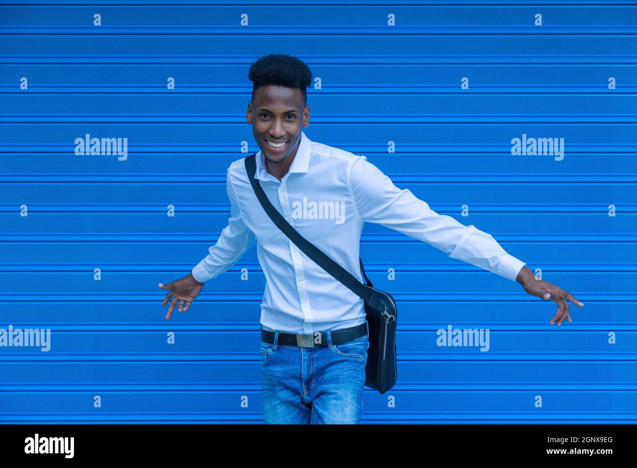 portrait african american man posing happy with white shirt and ...
