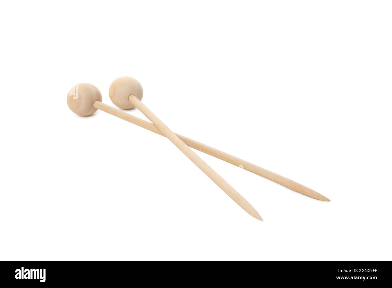Wooden knitting needles isolated on white background. Stock Photo