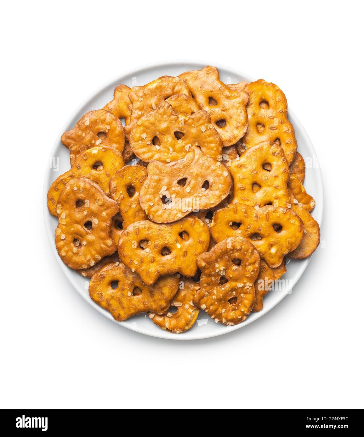 Salted mini flat pretzels isolated on white background. Stock Photo