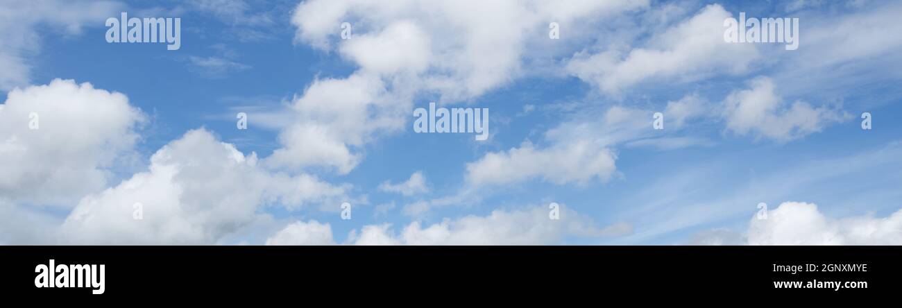 Blue sky background with white clouds. Panorama Stock Photo - Alamy