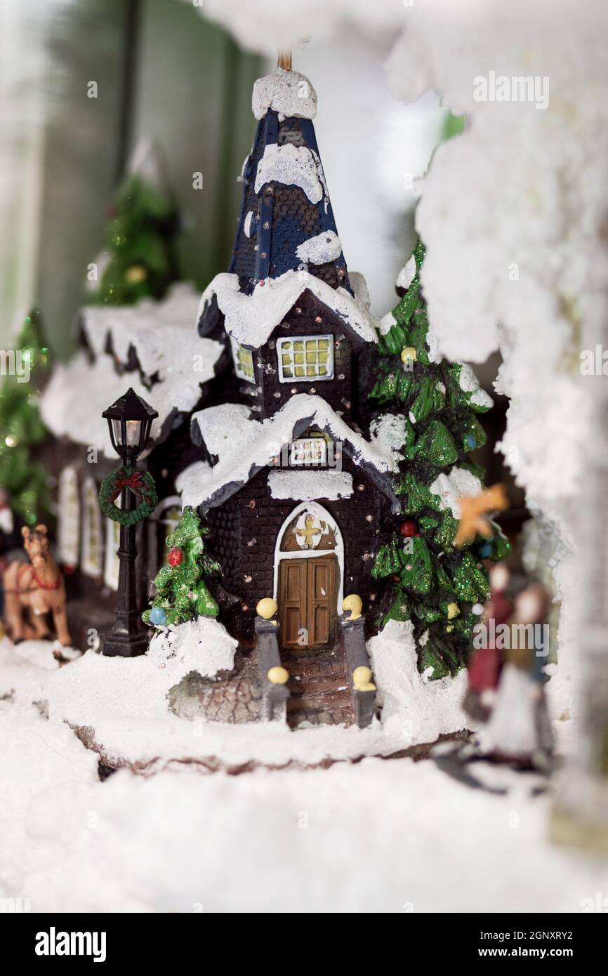 Christmas village miniatures with twinkling lights Stock Photo Alamy