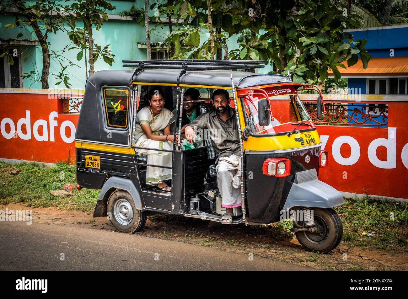 Some locals take a break in their Rickshaw in Kerala, India Stock Photo ...