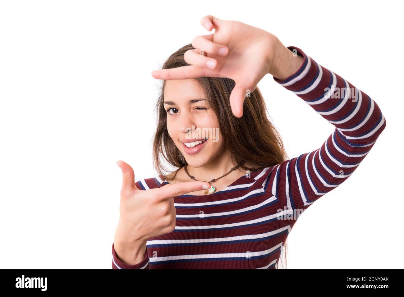 Young woman making framing key gesture - isolated over white Stock ...