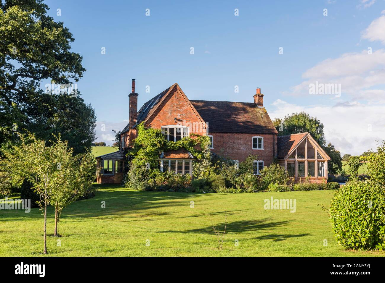Garden of Hampshire farmhouse dating from 1850, UK Stock Photo