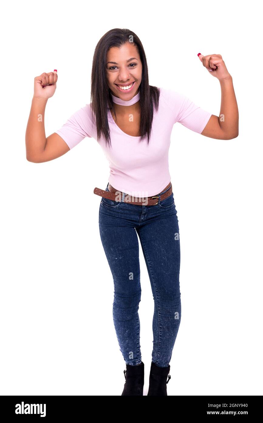 Studio shot: Happy African woman with raised arms Stock Photo - Alamy