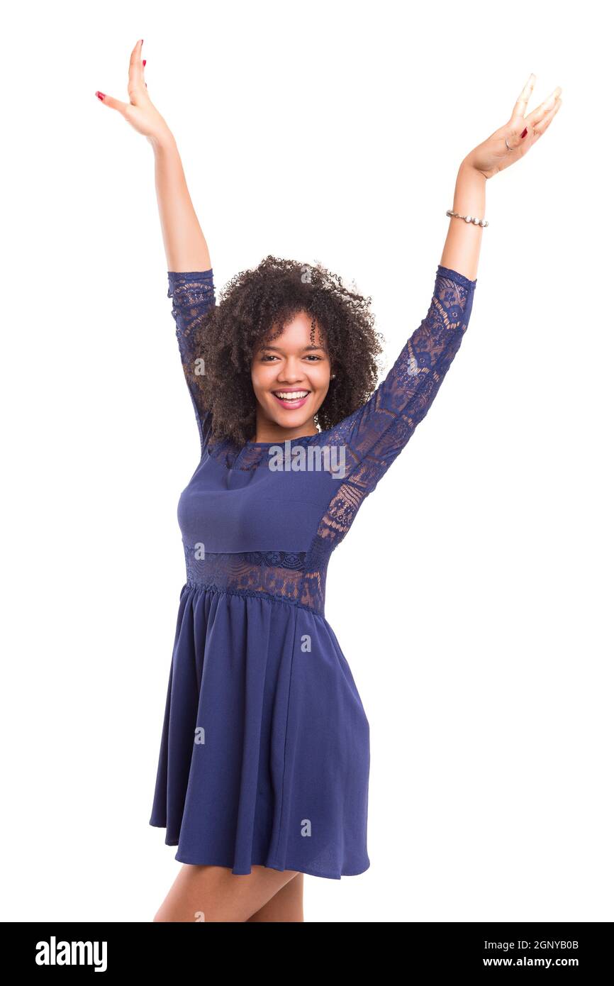 Studio shot: Happy African woman with raised arms Stock Photo - Alamy
