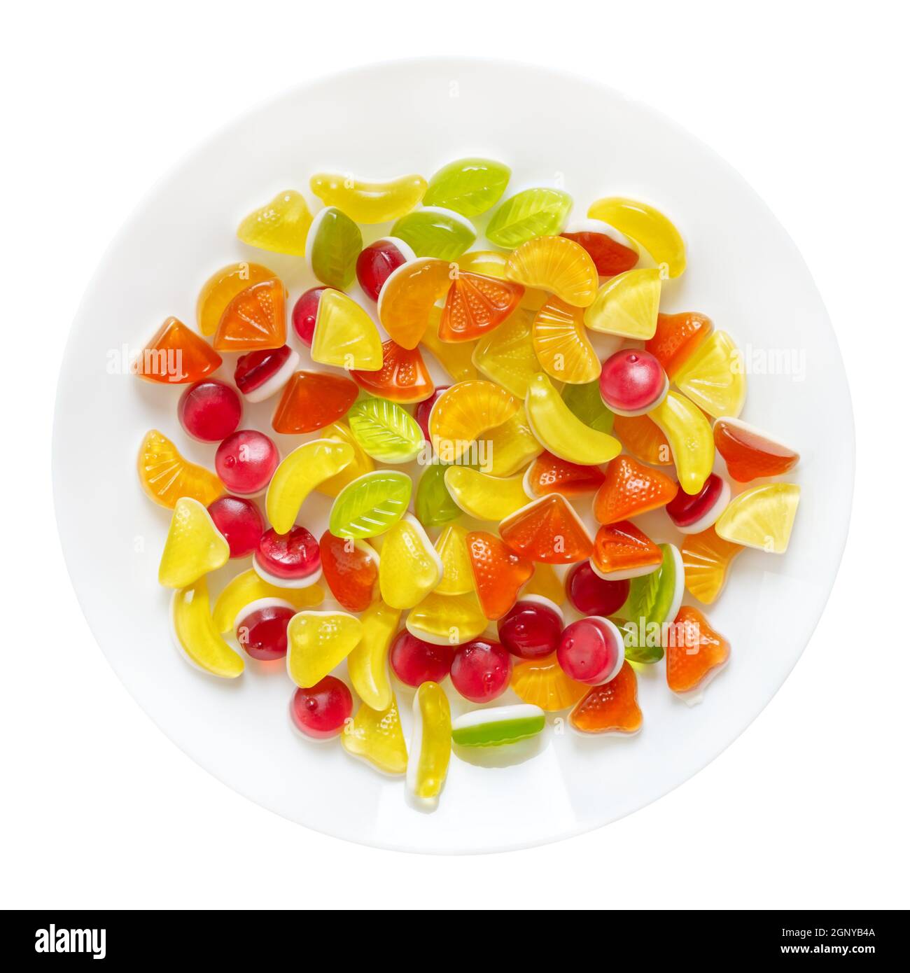 Gummy candies in the form of fruit slices on a plate isolated on a white  background. Top view Stock Photo - Alamy