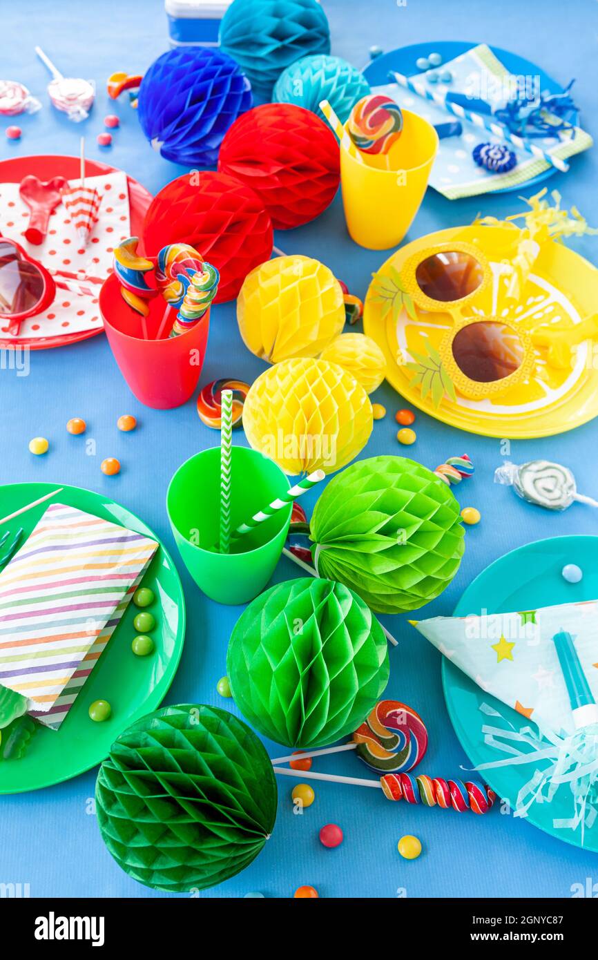 Colorful table setting with decorations for a party / kids birthday ...