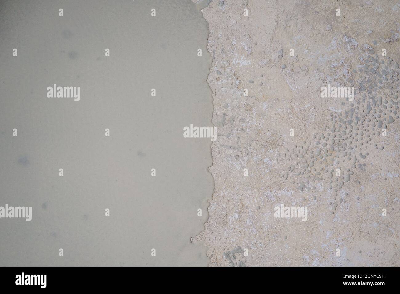 floor partially covering with self-levelling cement mortar Stock Photo