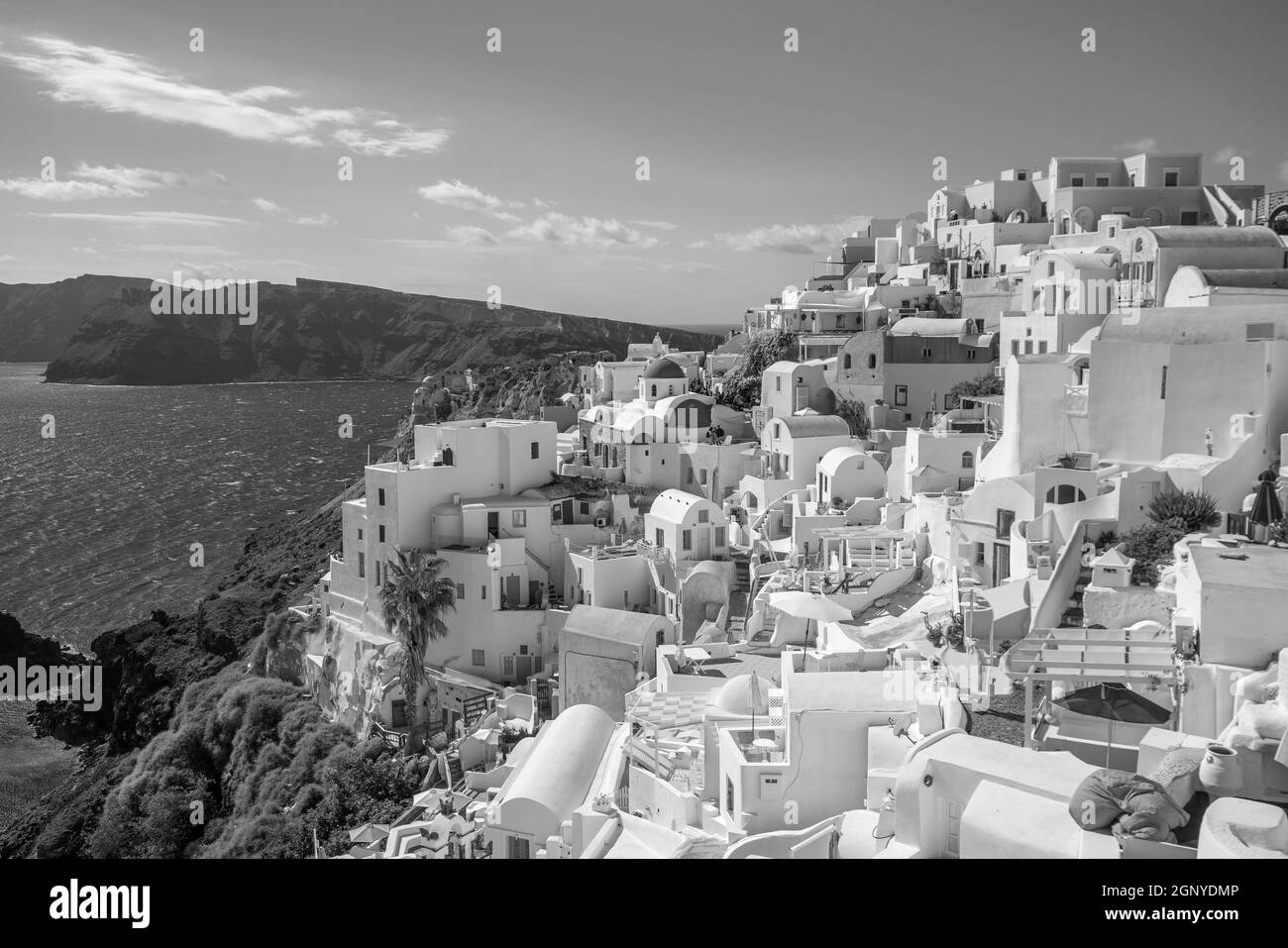 Oia town cityscape at Santorini island in Greece. Aegean sea in black and white Stock Photo