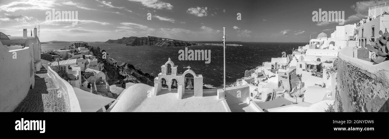 Oia town cityscape at Santorini island in Greece. Aegean sea in black and white Stock Photo
