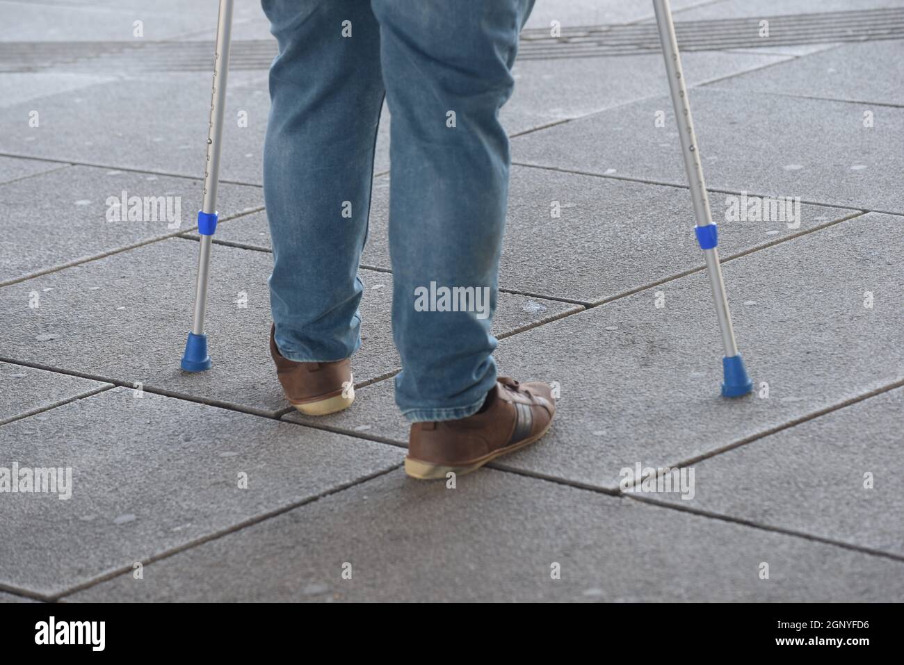 crutches as a walking aid for people with walking disabilities Stock Photo