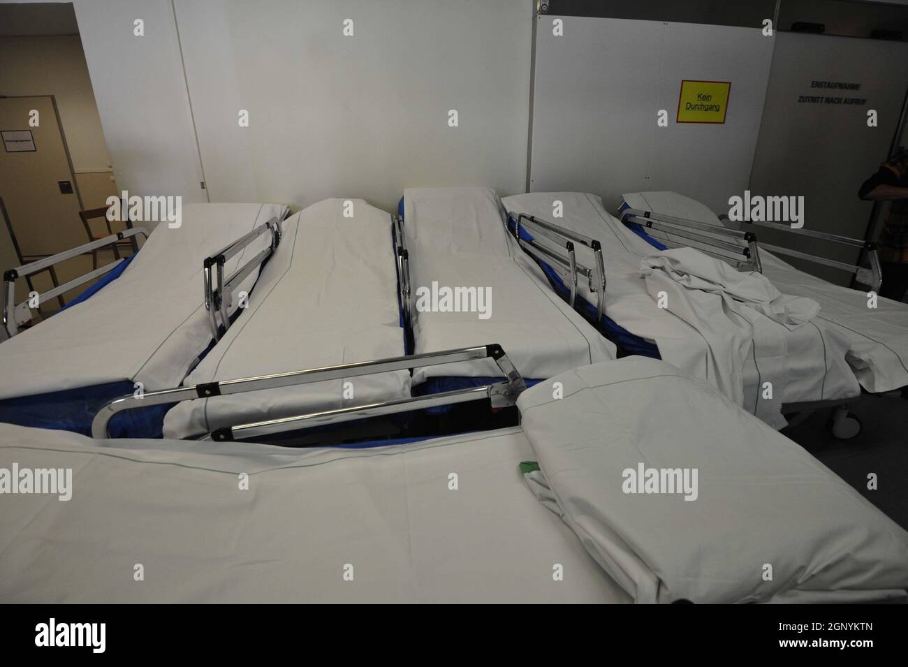 Hospital bed and bed occupancy in health care and medical system Stock