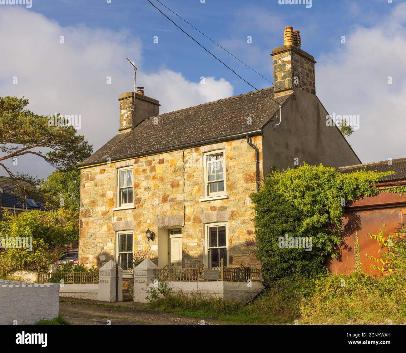 'Rose Villa'. A 19th century Welsh stone cottage used as a holiday home. Brynhenllan, Dinas, Pembrokeshire, Wales. UK. Stock Photo