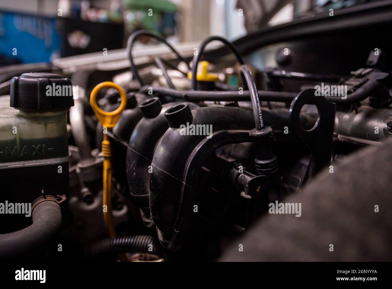 Car engine detail in a interior ready for repair Stock Photo Alamy