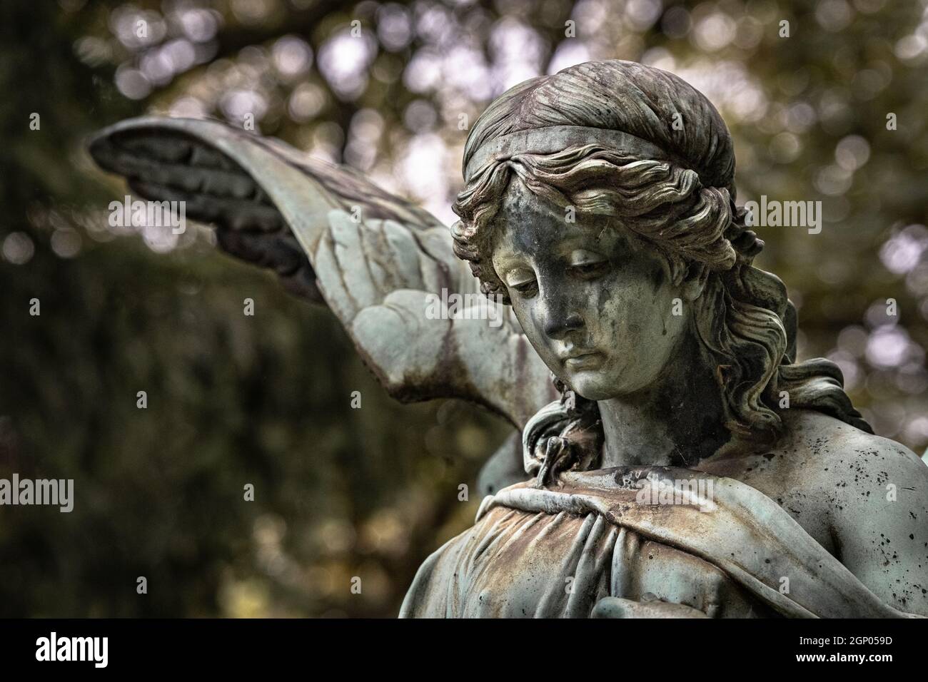 Angel statue on melaten cemetary in Cologne Stock Photo