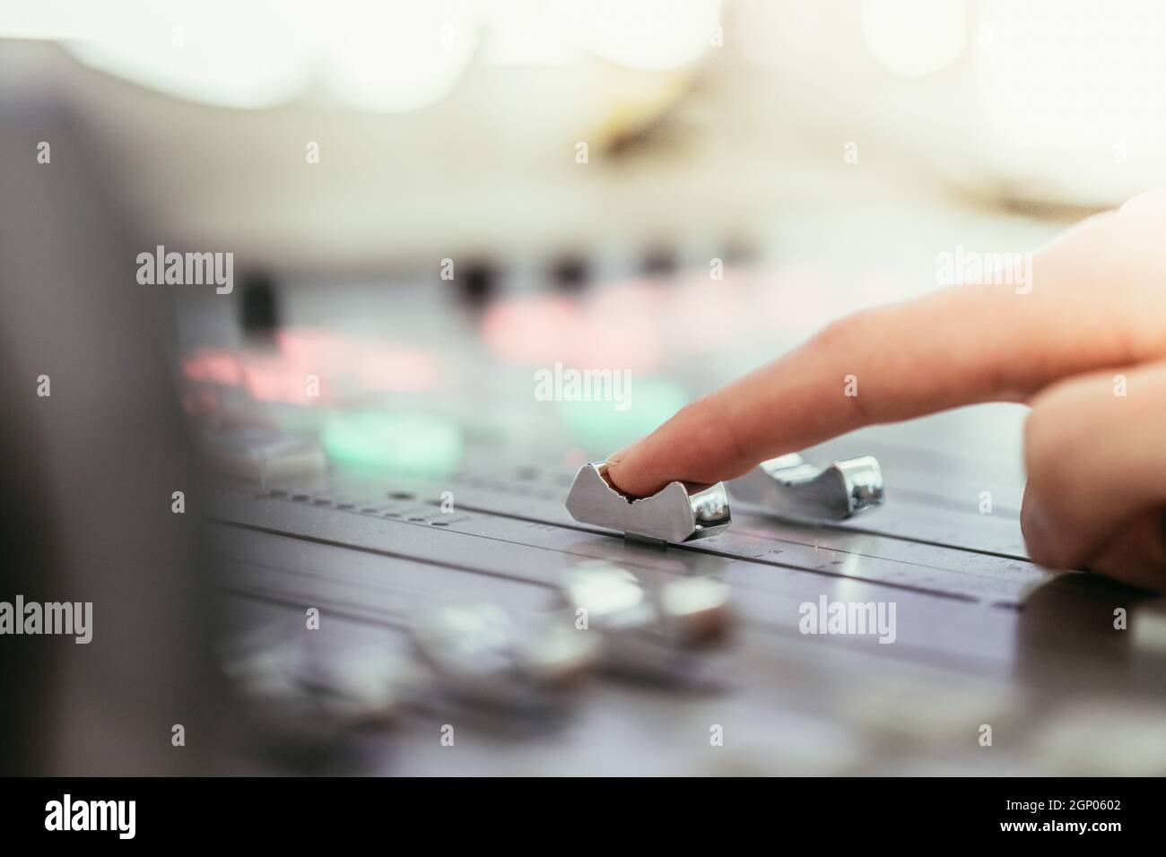 Moderator and soundboard in radio broadcasting studio Stock Photo - Alamy