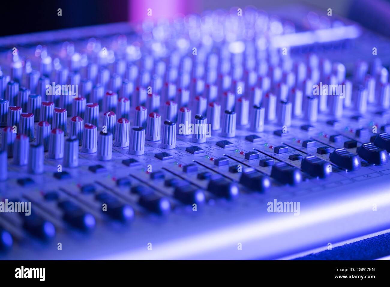 Professional music production in a sound recording studio, mixer desk ...