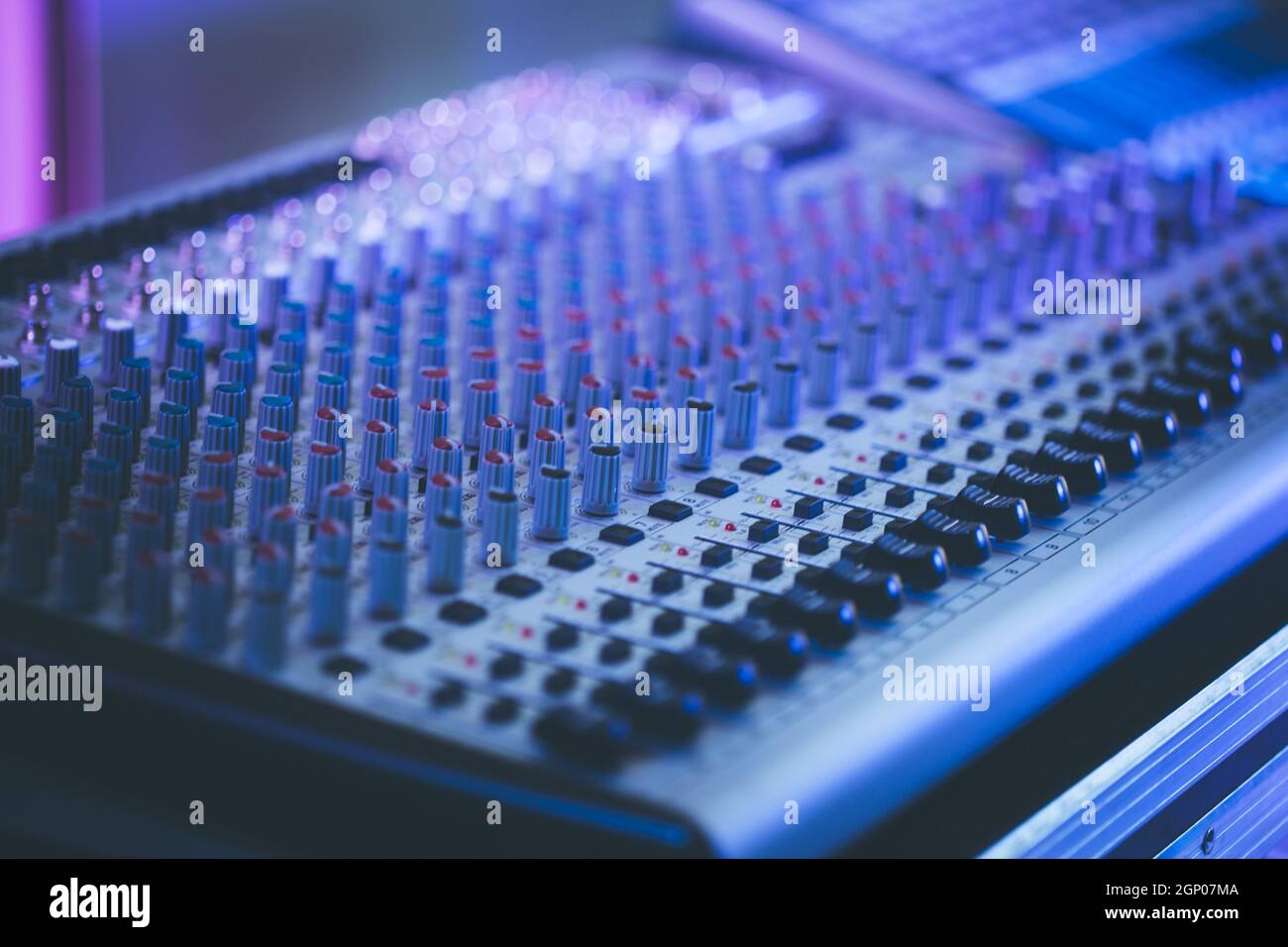 Professional music production in a sound recording studio, mixer desk ...