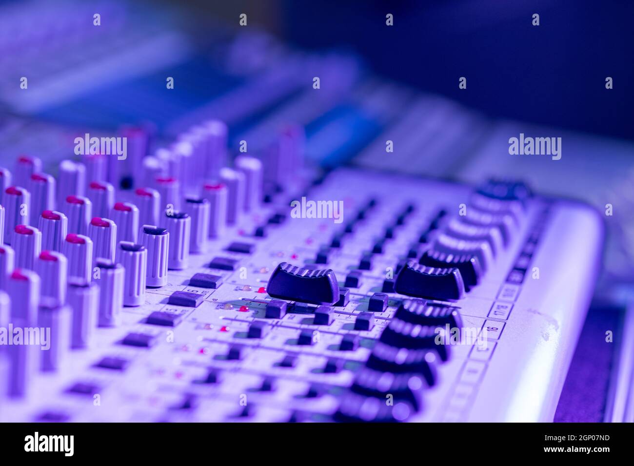 Professional music production in a sound recording studio, mixer desk ...