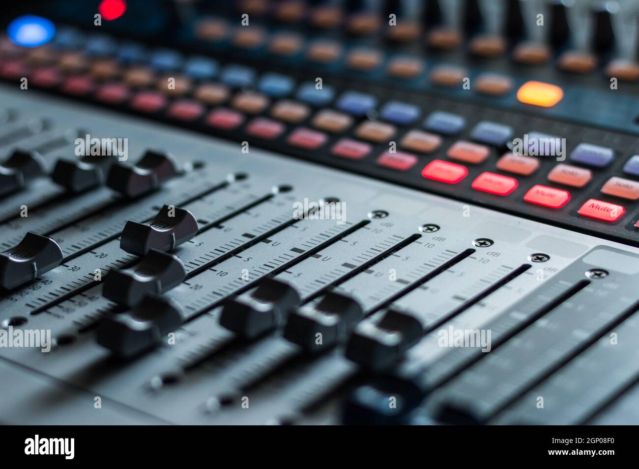 Professional music production in a sound recording studio, mixer desk ...