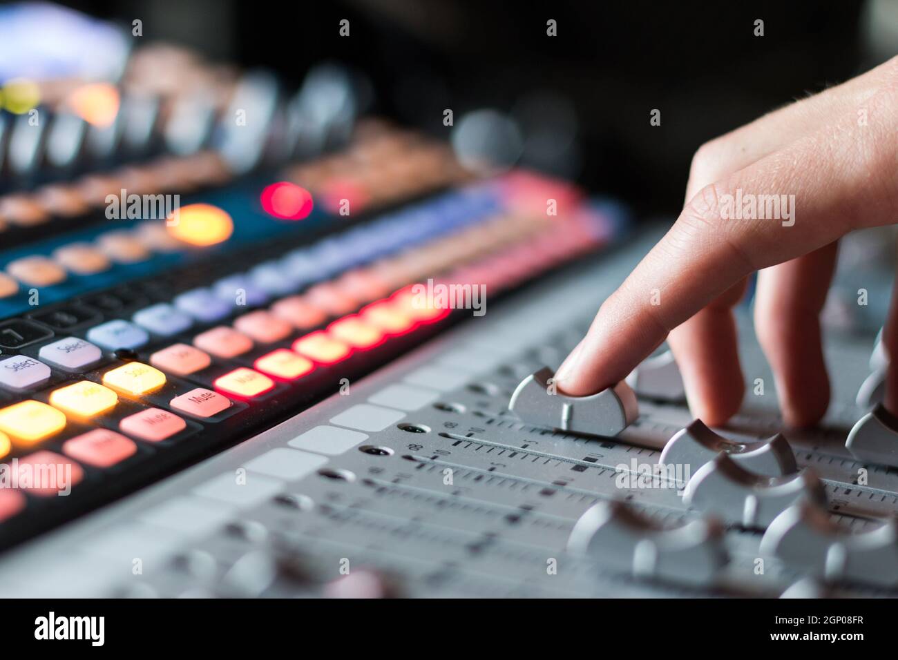 Professional music production in a sound recording studio, mixer desk
