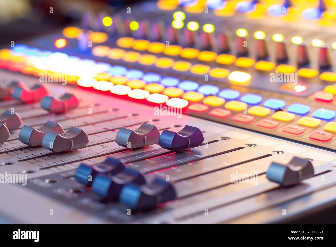 Professional music production in a sound recording studio, mixer desk ...