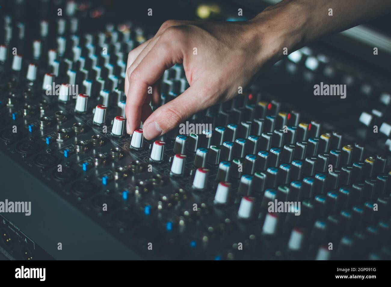 Professional music production in a sound recording studio, mixer desk ...