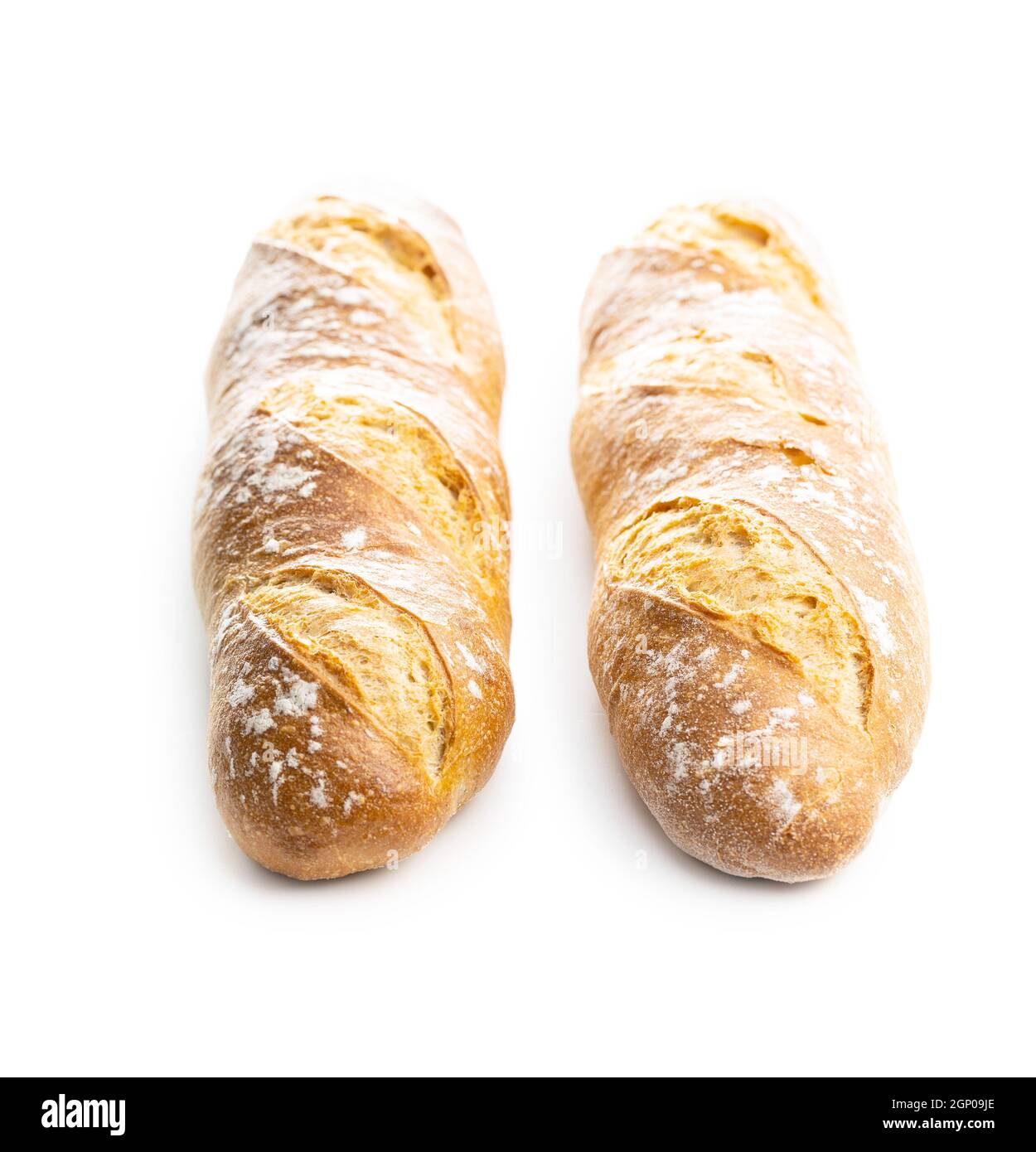 Two crispy fresh baguettes isolated on a white background. Stock Photo