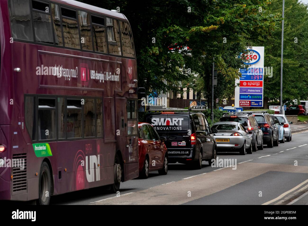 Drivers queue for fuel in both directions at an ESSO petrol station in