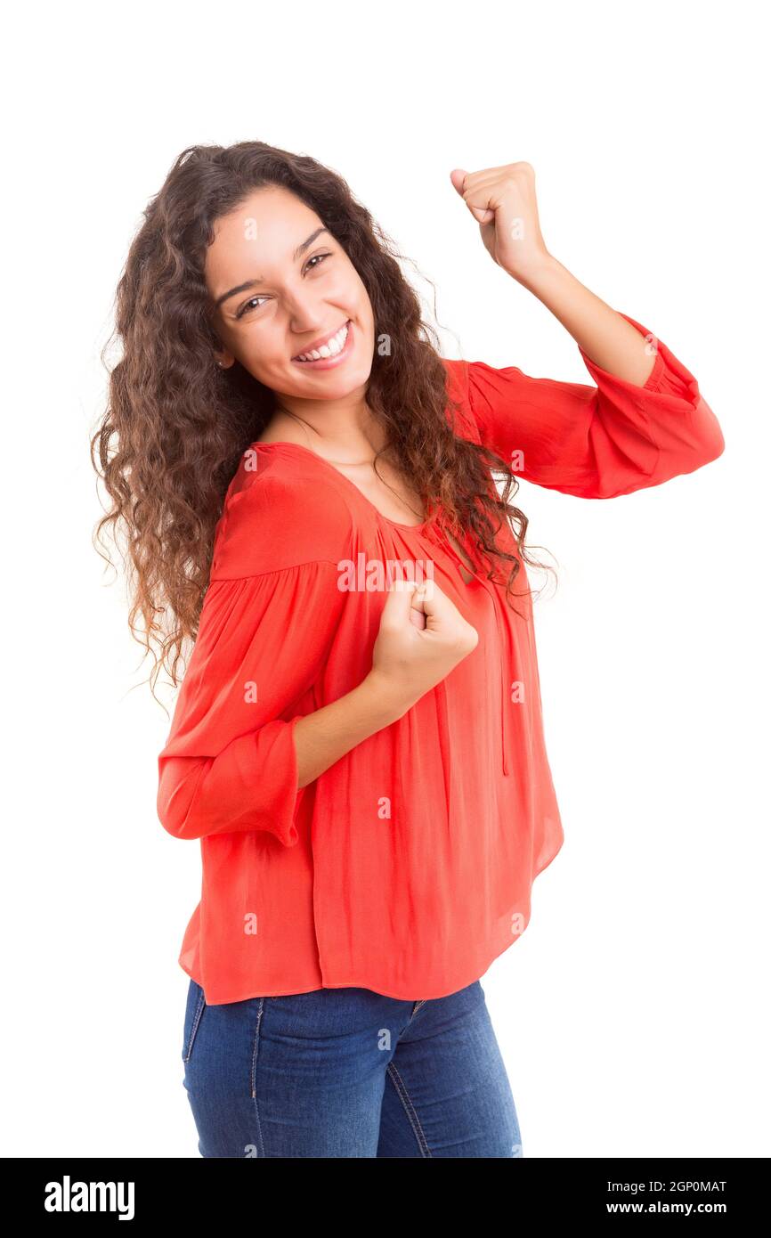 Studio shot: Happy woman with raised arms Stock Photo - Alamy