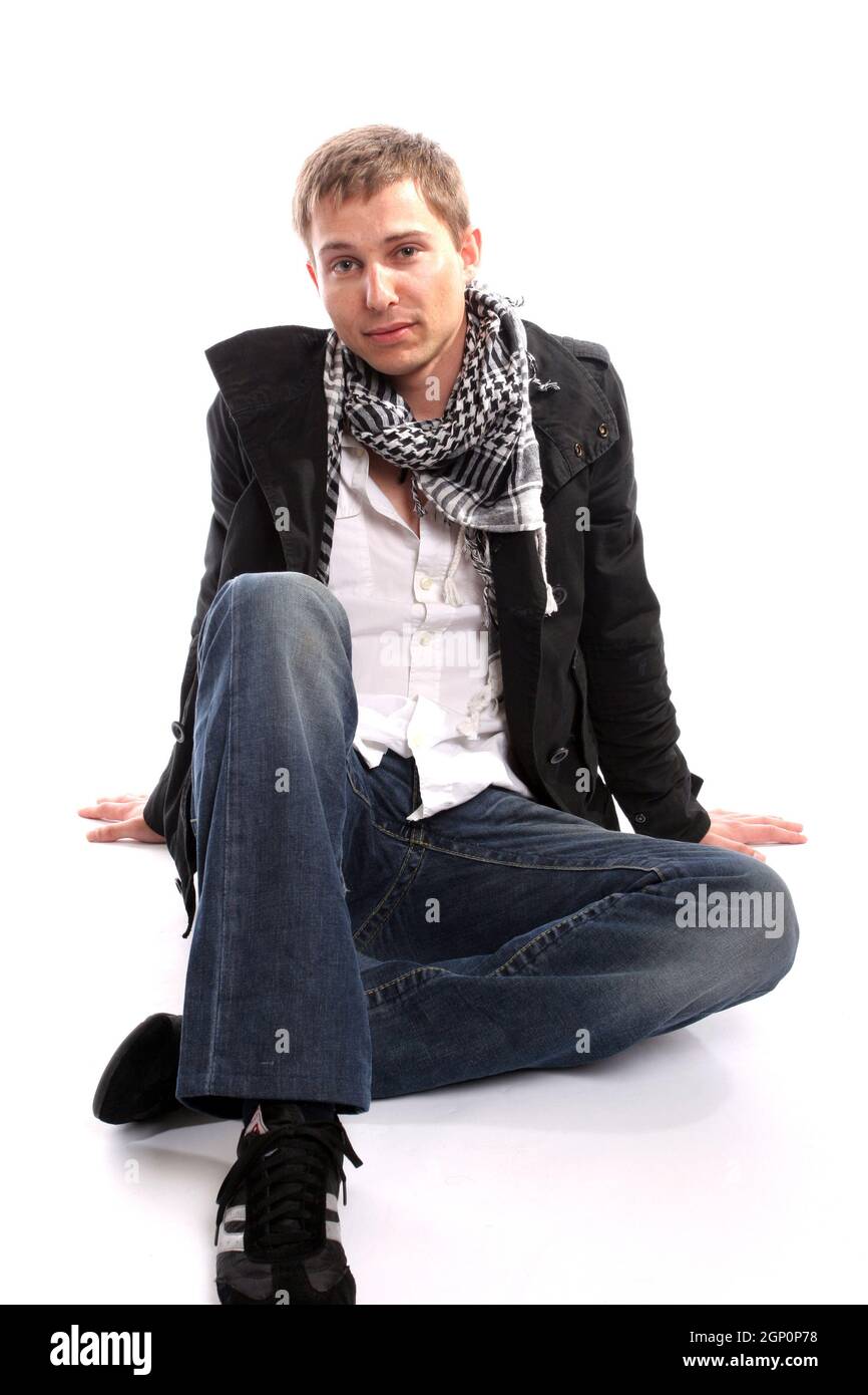 Young casual man posing, isolated in white background Stock Photo - Alamy