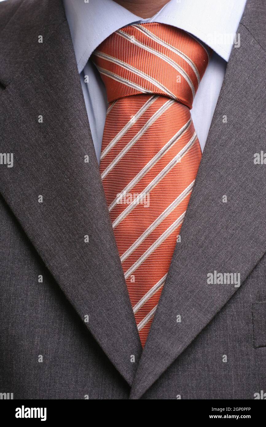 Detail of a suit and a tie in double windsor knot isolated Stock