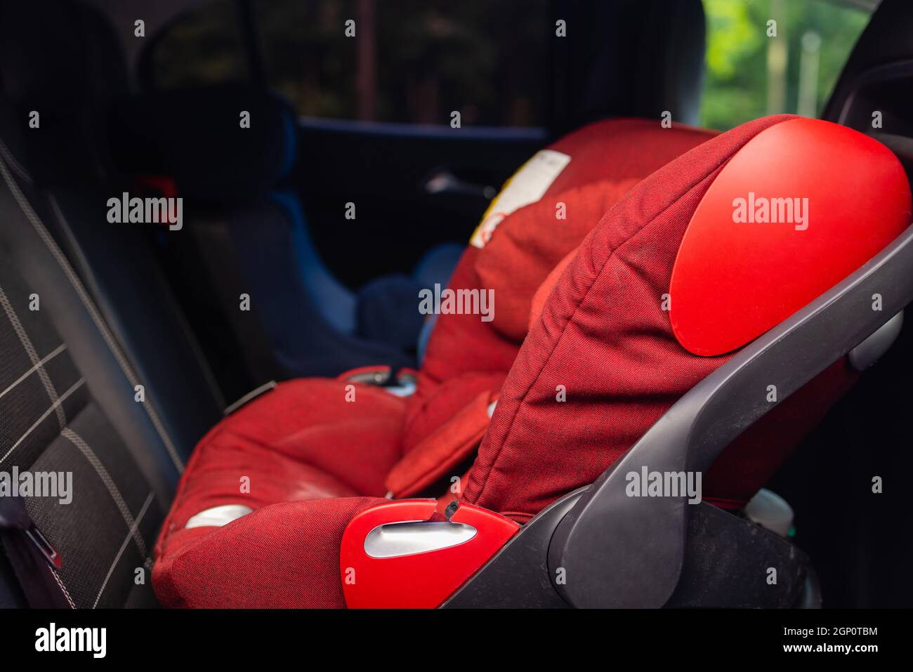 Child safety seat in the back of the car. Baby car seat for safety. Car