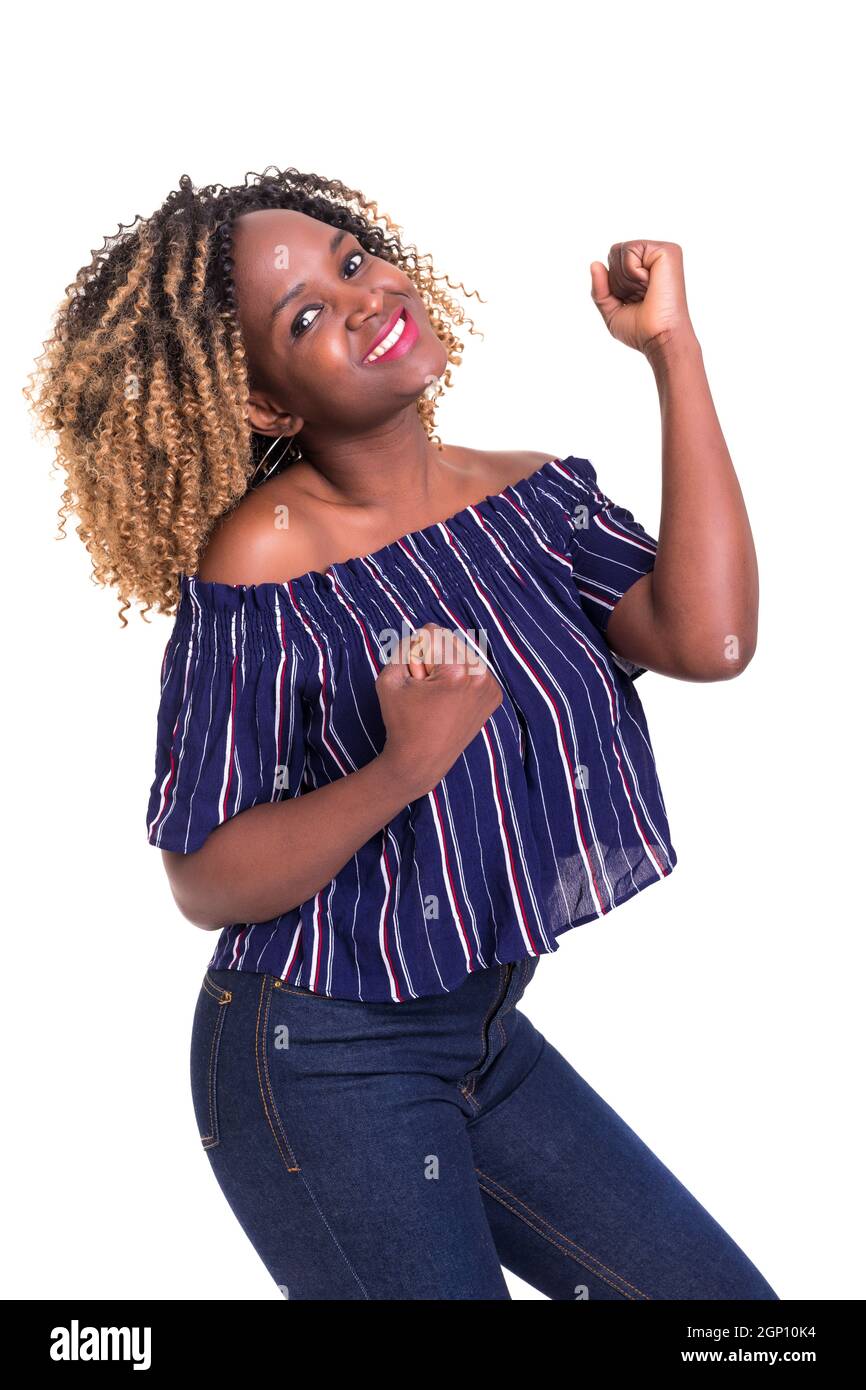Studio shot of a Very Happy african woman with arms raised Stock Photo ...