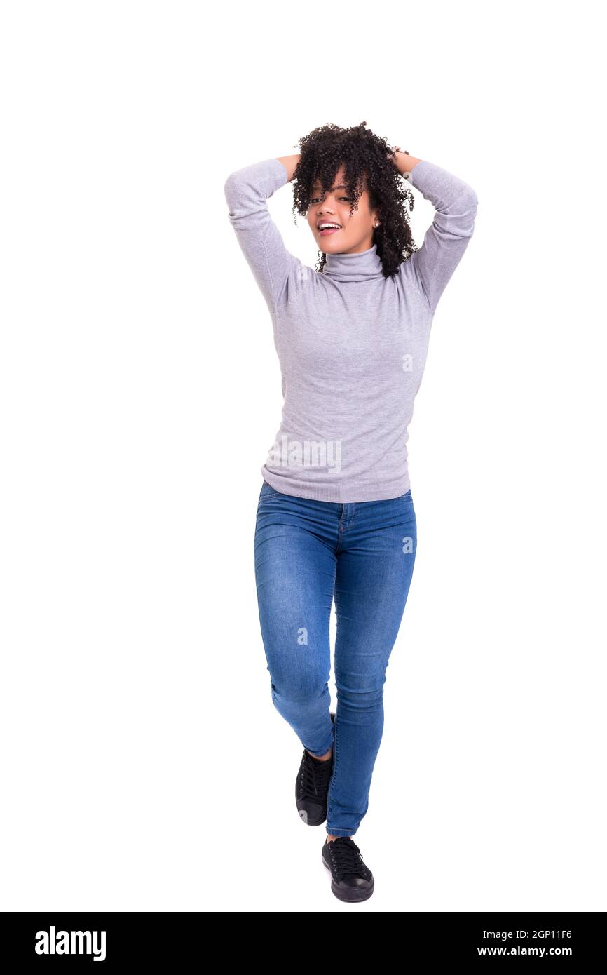 Studio shot of a Very Happy african woman with arms raised Stock Photo ...