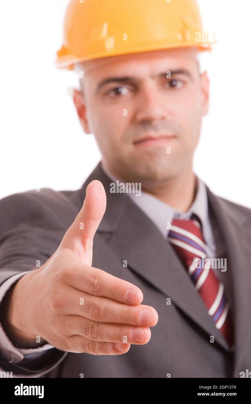 Young engineer offering handshake focus on hand Stock Photo Alamy