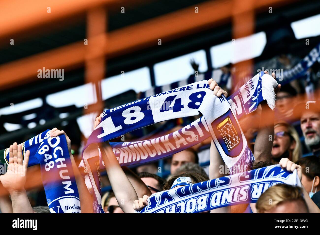 Vonovia Ruhrstadion Bochum, VfL Bochum fans hold up their fan scarves. Stock Photo