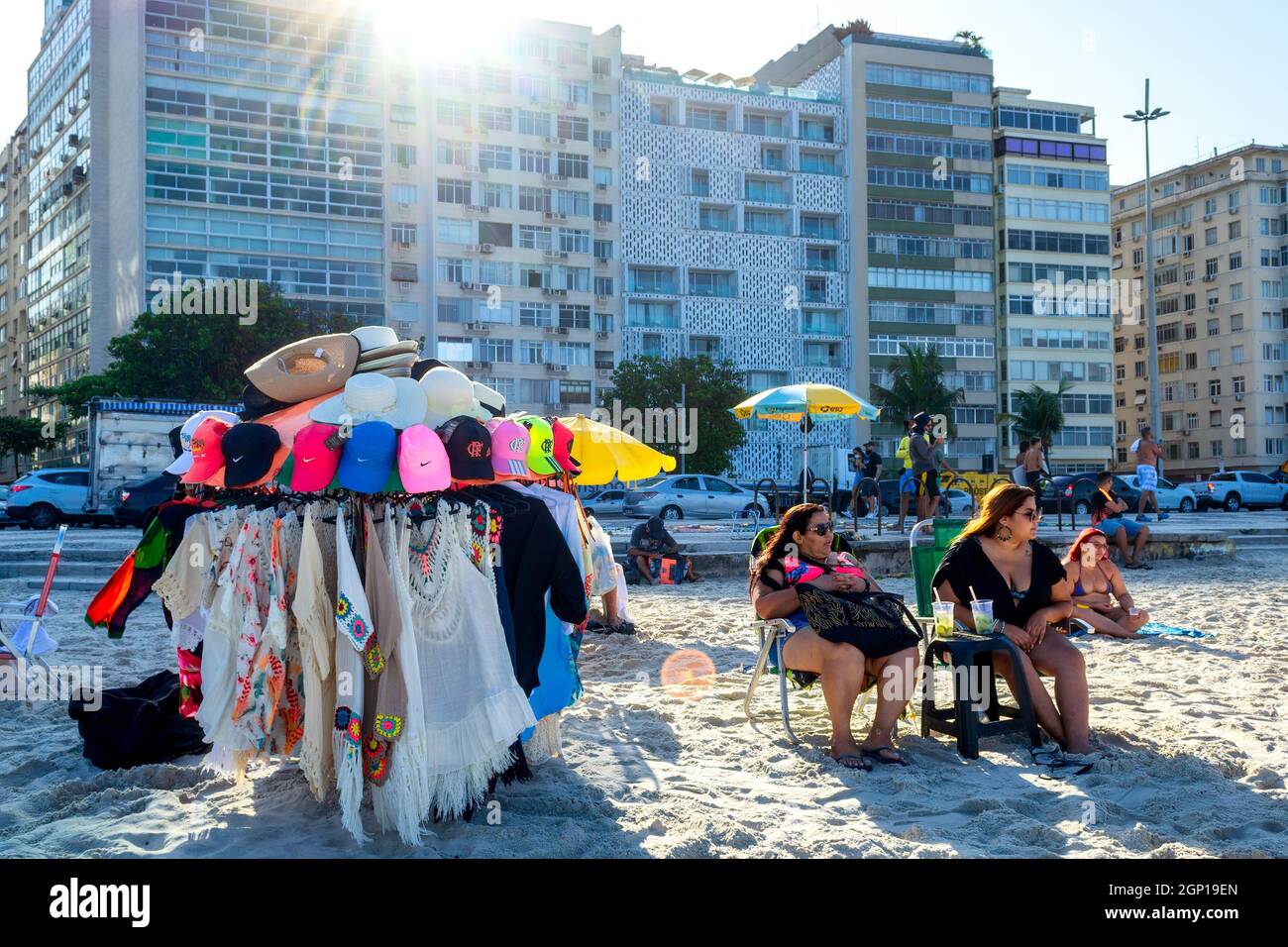 Small business selling clothes in the sand of the Copacabana Beach in Rio de Janeiro, Brazil. This place is a famous tourist attraction in the city. Stock Photo