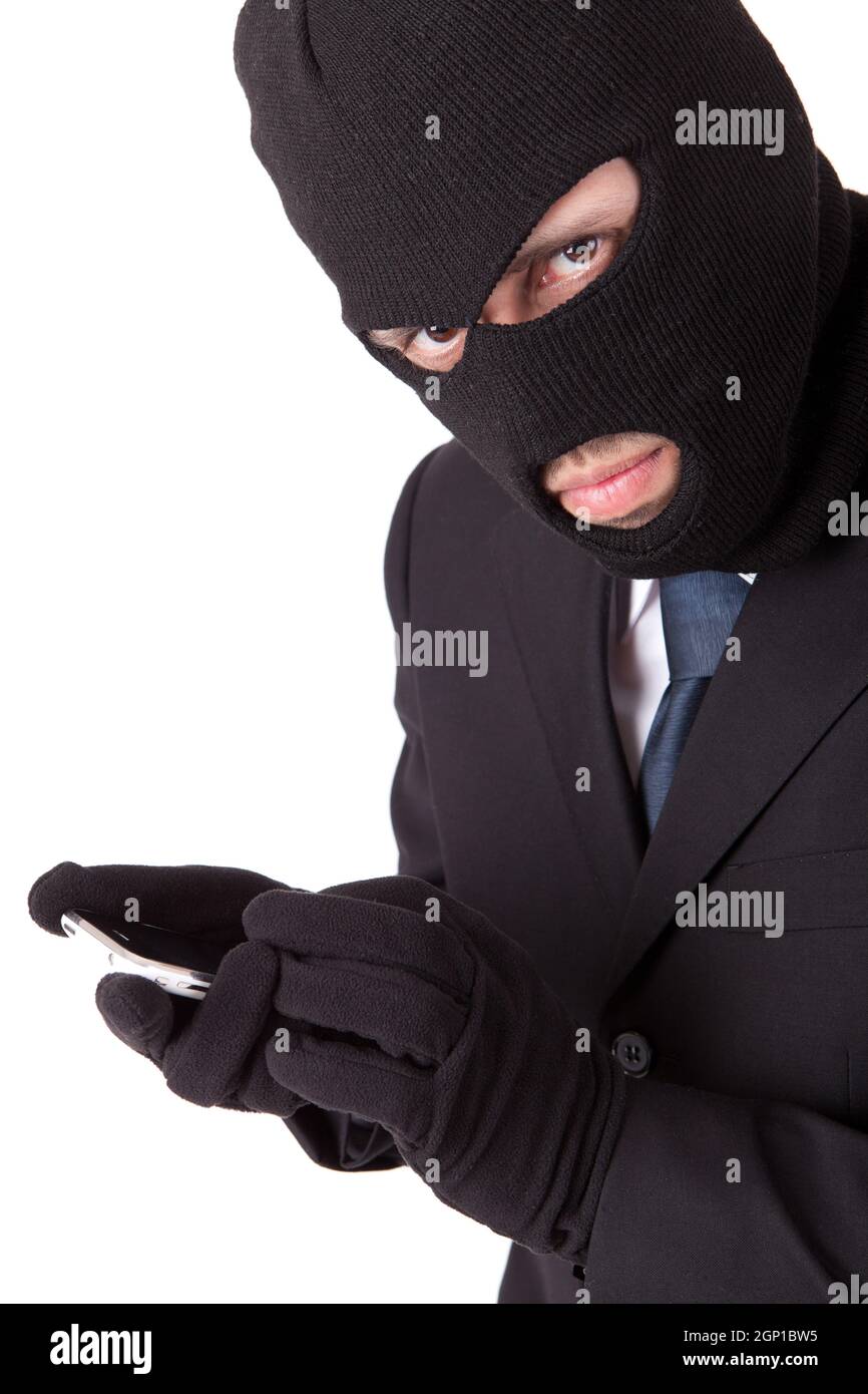 Disguised computer hacker hi-res stock photography and images - Alamy
