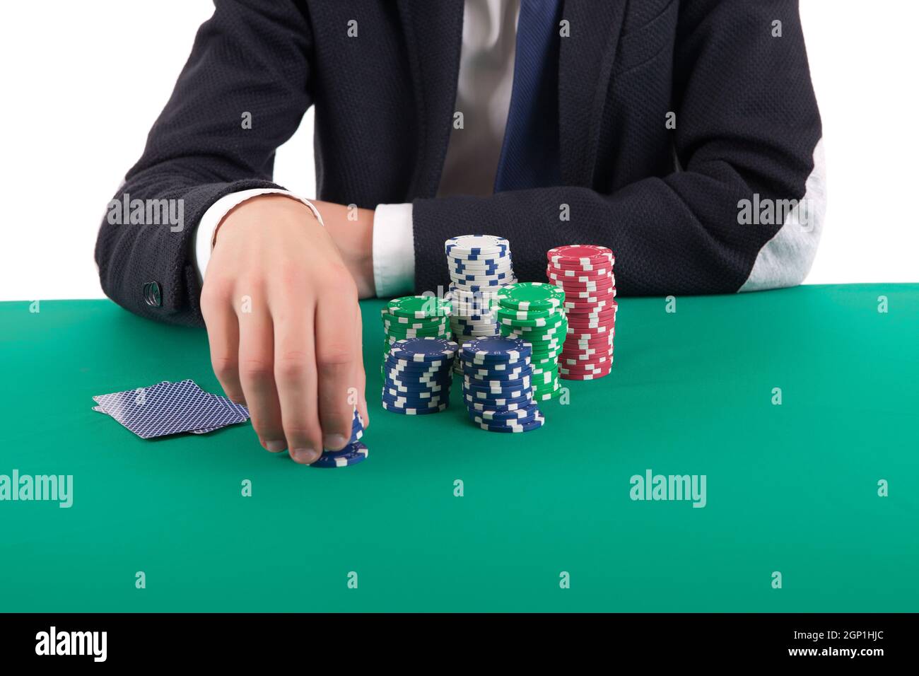 Young handsome man playing texas hold'em poker Stock Photo