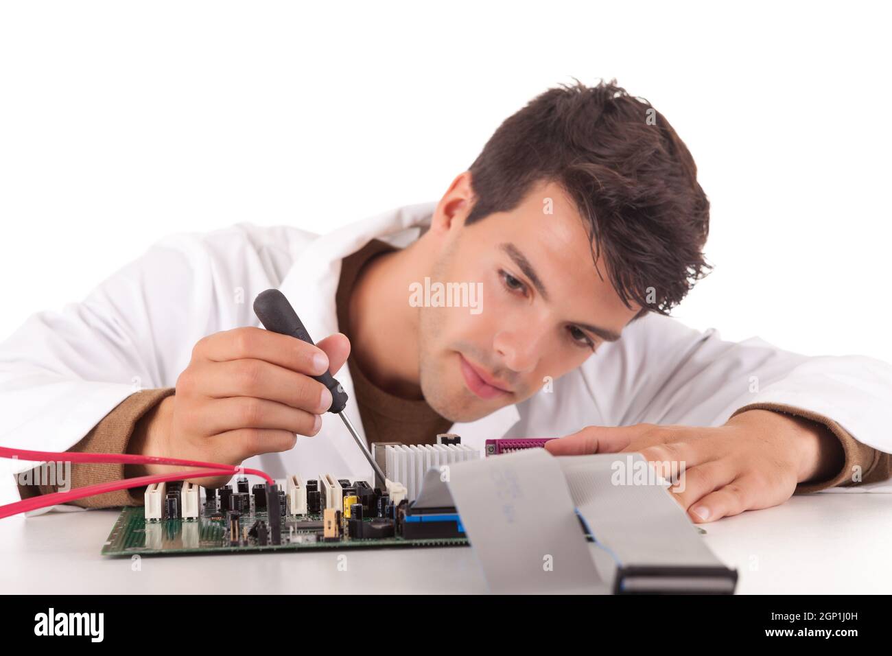 Happy and successful young computer engineer Stock Photo