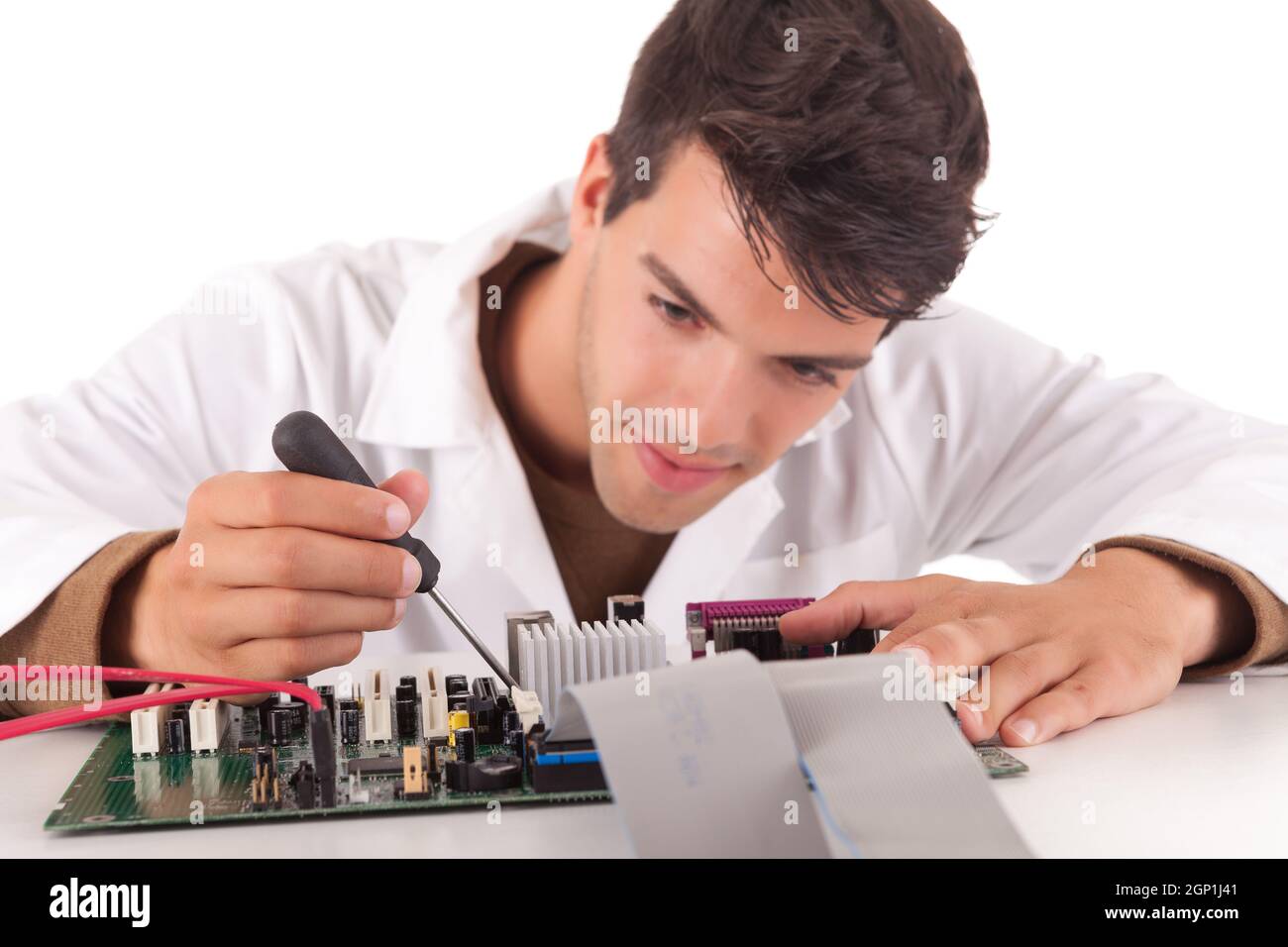 Happy and successful young computer engineer Stock Photo