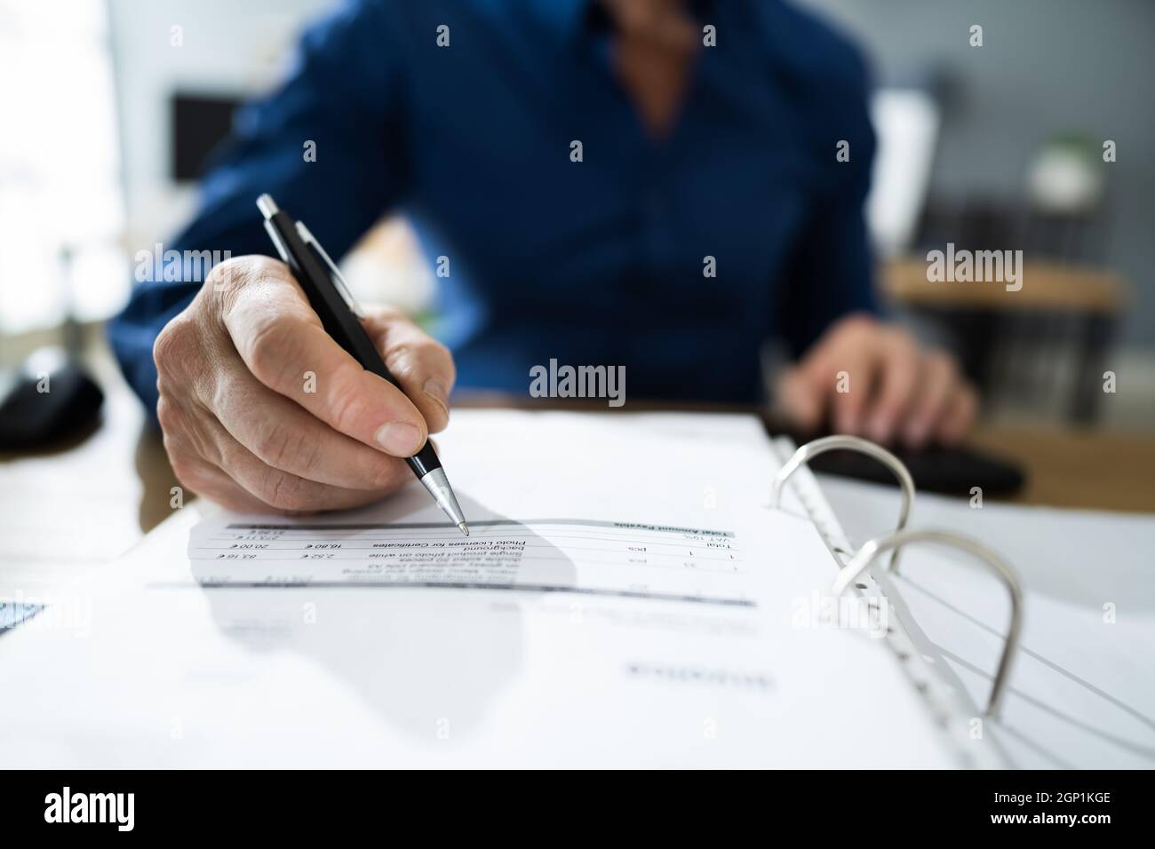 Corporate Tax Accountant At Desk Doing Invoice Bill Accounting Stock ...